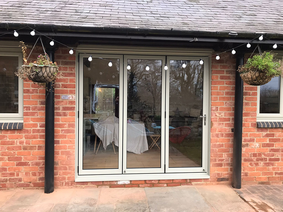 Green bi-fold doors